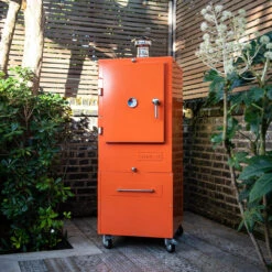 Charlie Oven Charcoal Oven In Saffron -BBQ Equipment Store Hero Orange Oven 07344.1674300776